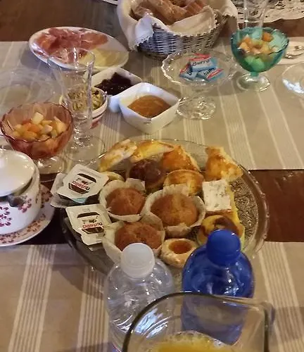 Alojamento de Acomodação e Pequeno-almoço La Palazza Russi